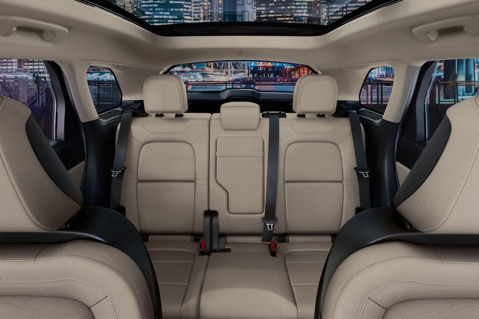 2025 Lincoln Corsair Interior shot of the second row and a city in the back view