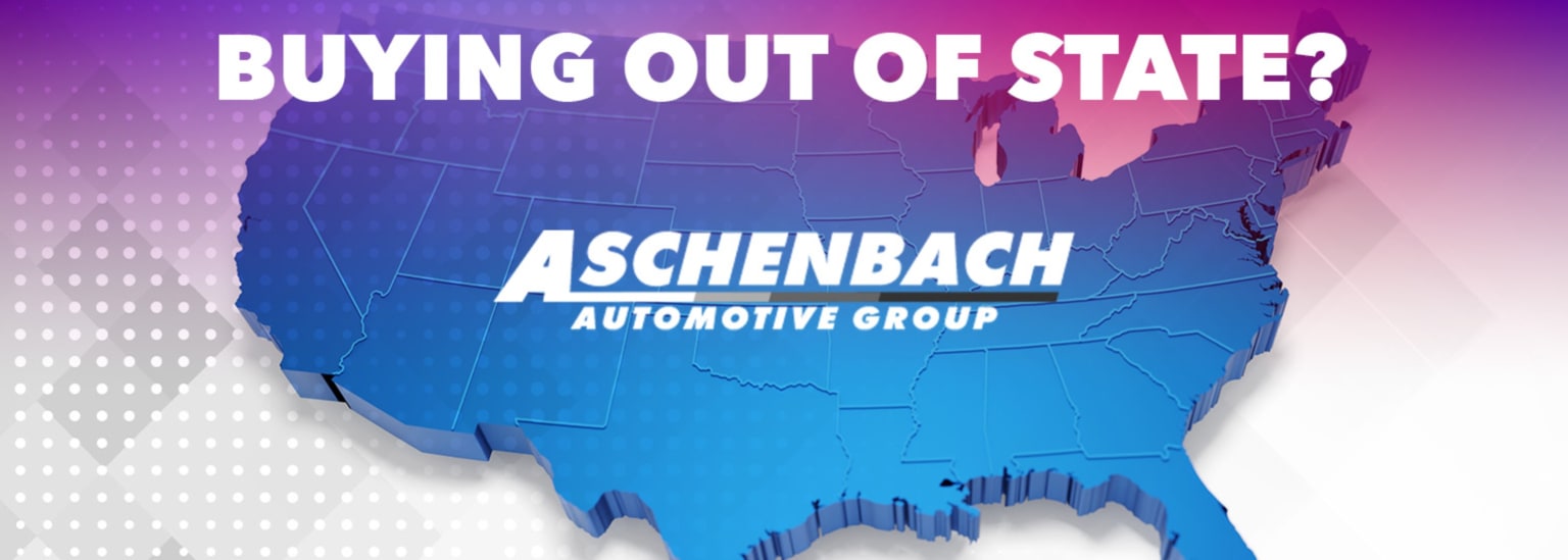 Blue 3D map of the United States with text "BUYING OUT OF STATE?" and "ASCHENBACH AUTOMOTIVE GROUP" on gradient purple and pink background with dotted pattern.