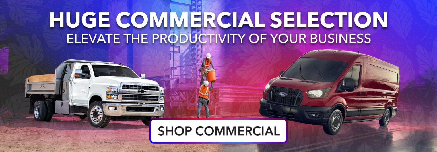 A commercial selection of vehicles featuring a white truck and a red van, set against a vibrant background of colorful buildings and structures, promoting increased business productivity.