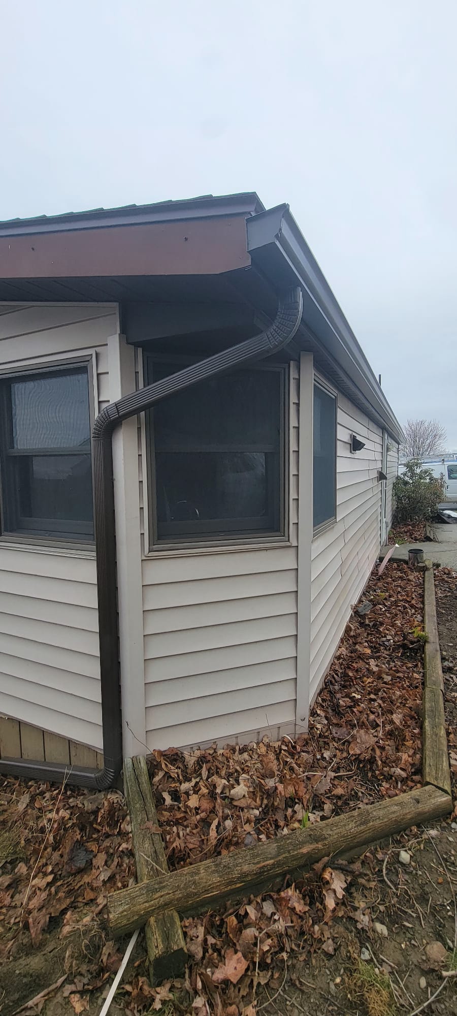 Nova Solution technician repairing gutters on a home in Albany