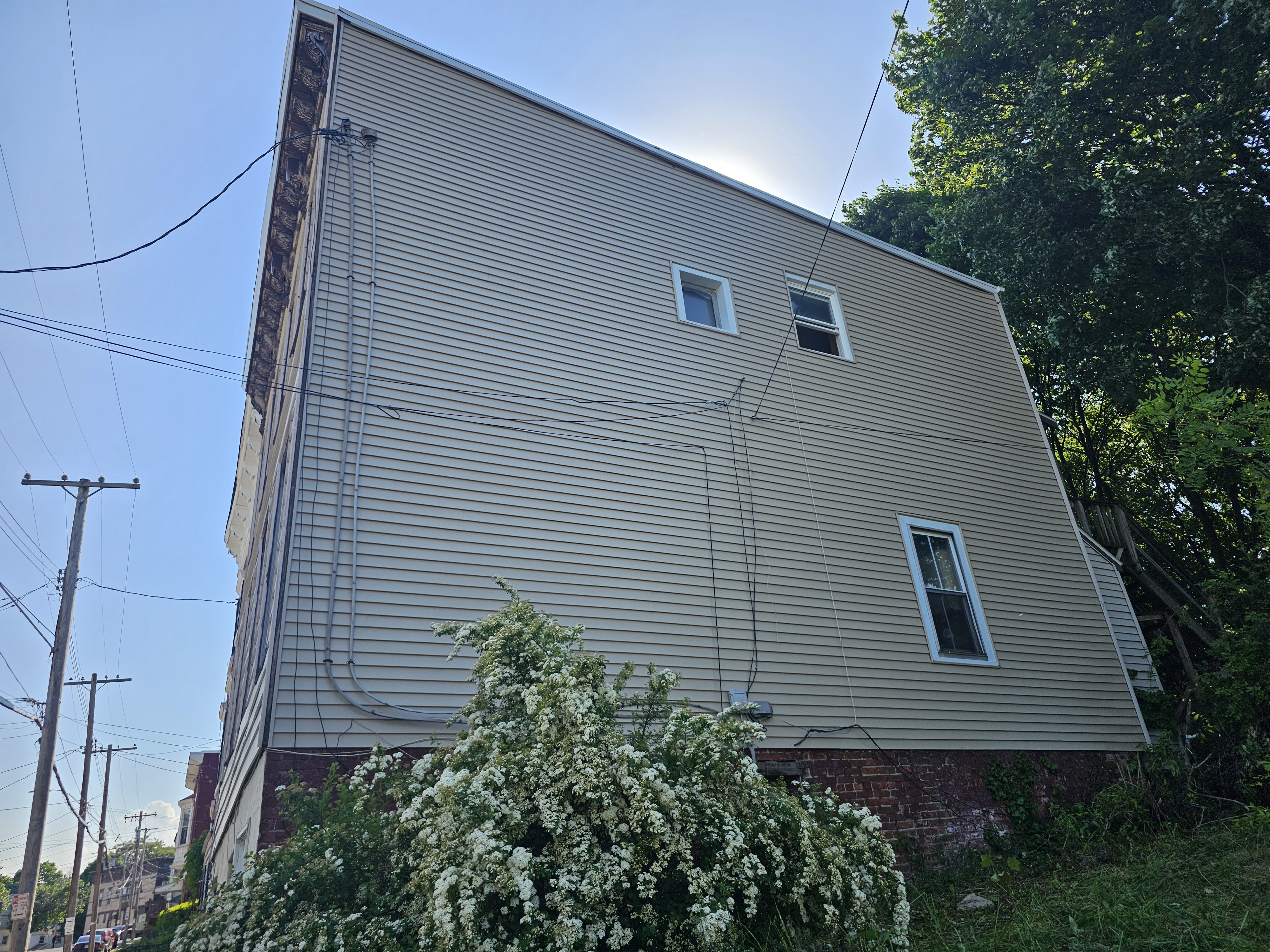 Multistory Exterior Transformation: Premium Vinyl Siding Installation