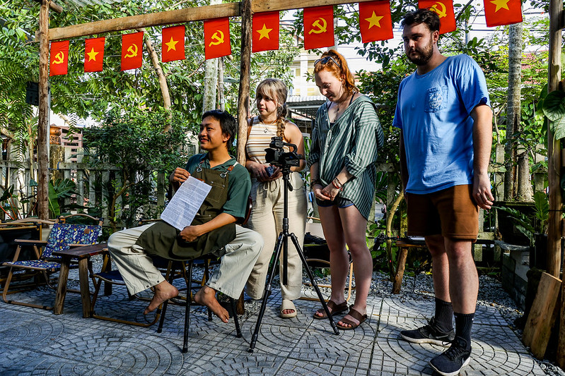 Filming an interview at a café, Vietnam