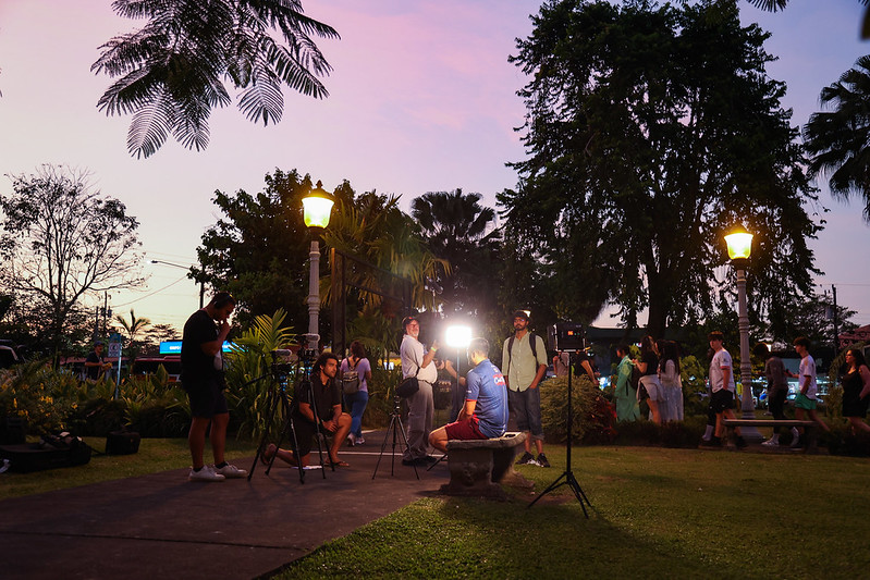 Filming an interview in central park, Costa Rica