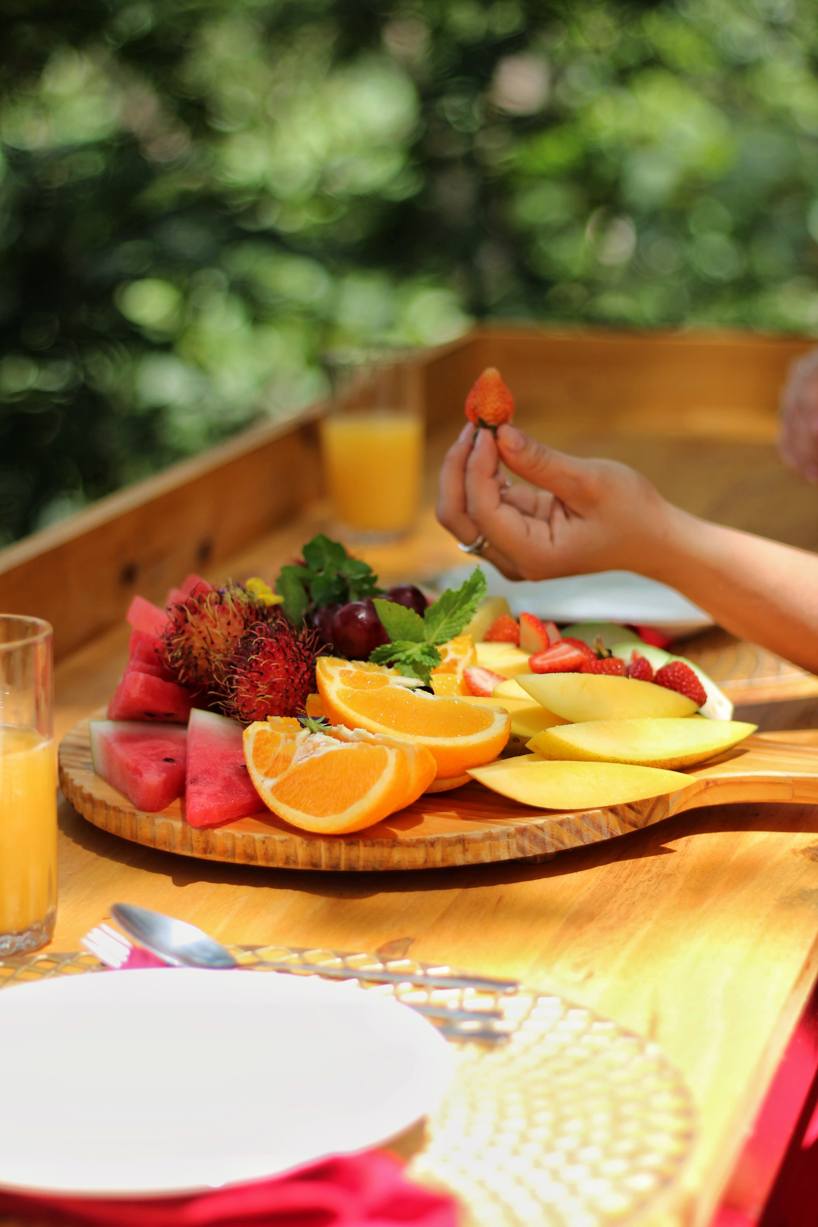 Fruit food dish with a view of the Arenal Volcano in La Fortuna, Costa Rica.