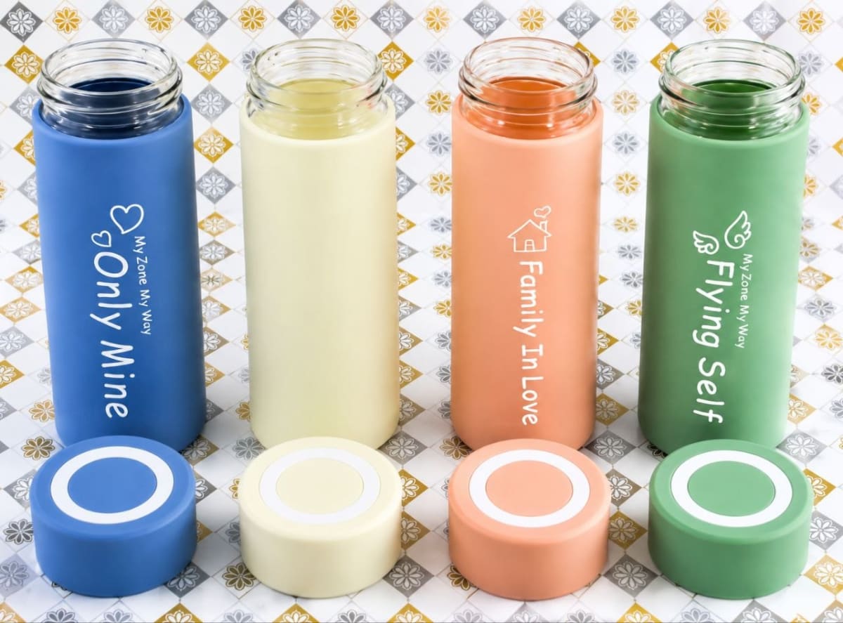 Glass water bottle with a silicone sleeve