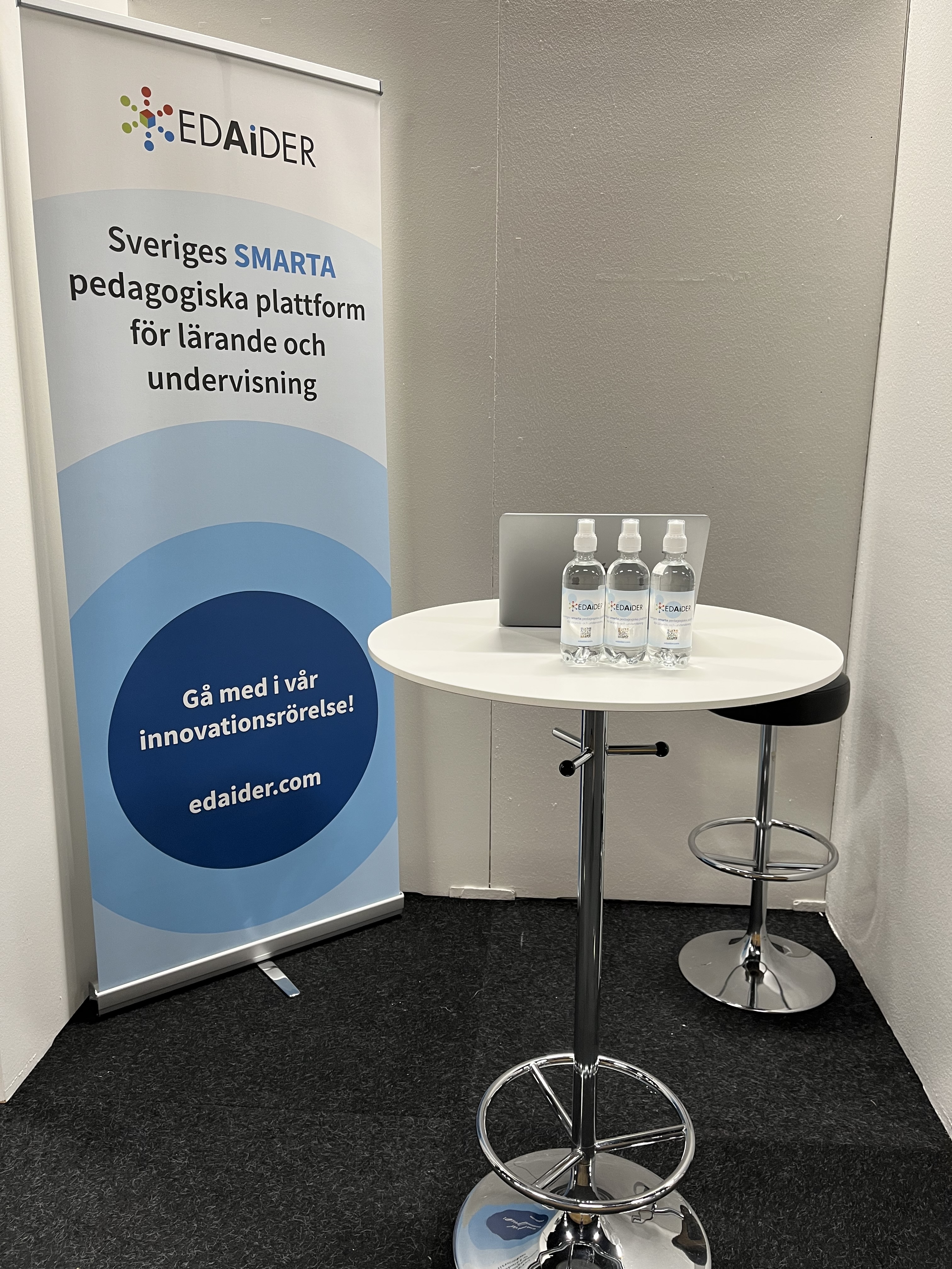 Rollup and water bottles at an event