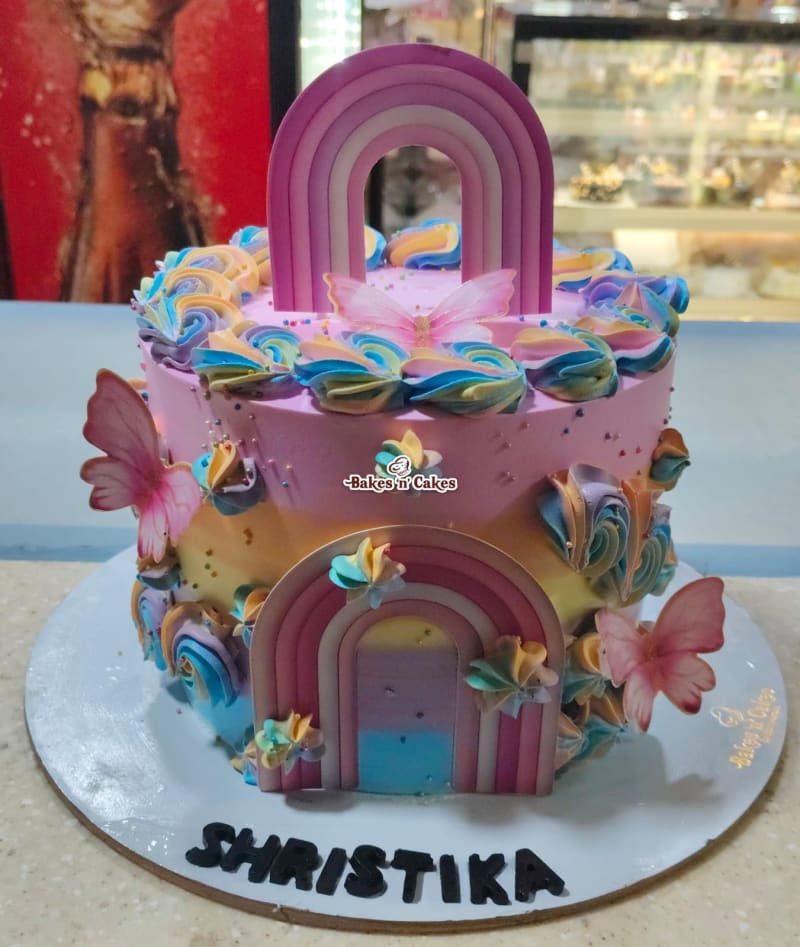 Pastel Rainbow Arch Butterfly Cake
