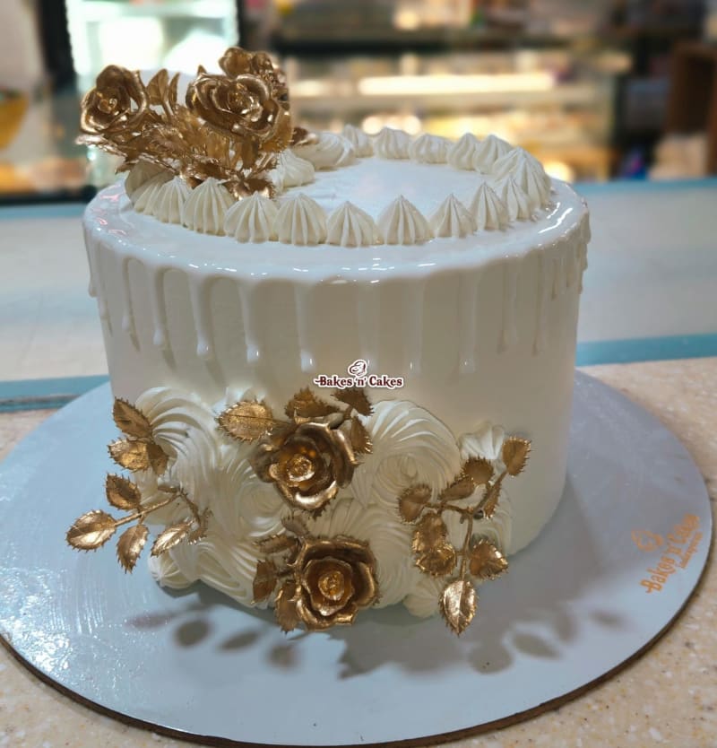 White & Gold Roses Drip Cake