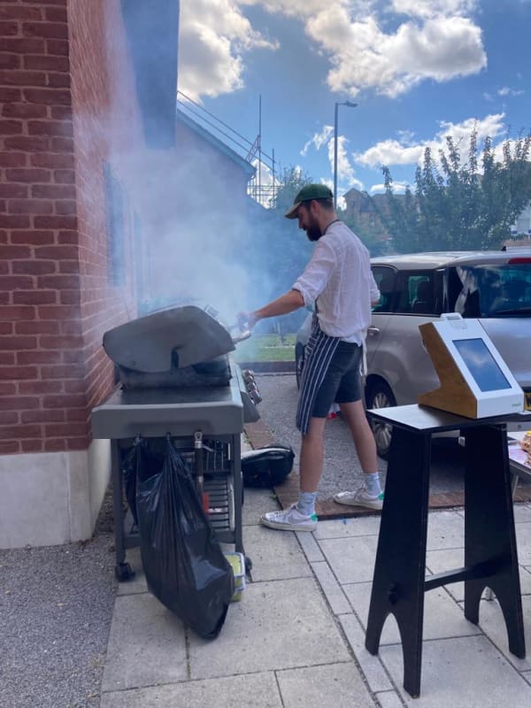 Me standing over a smoking gas BBQ, having just heroically extinguished the fire.