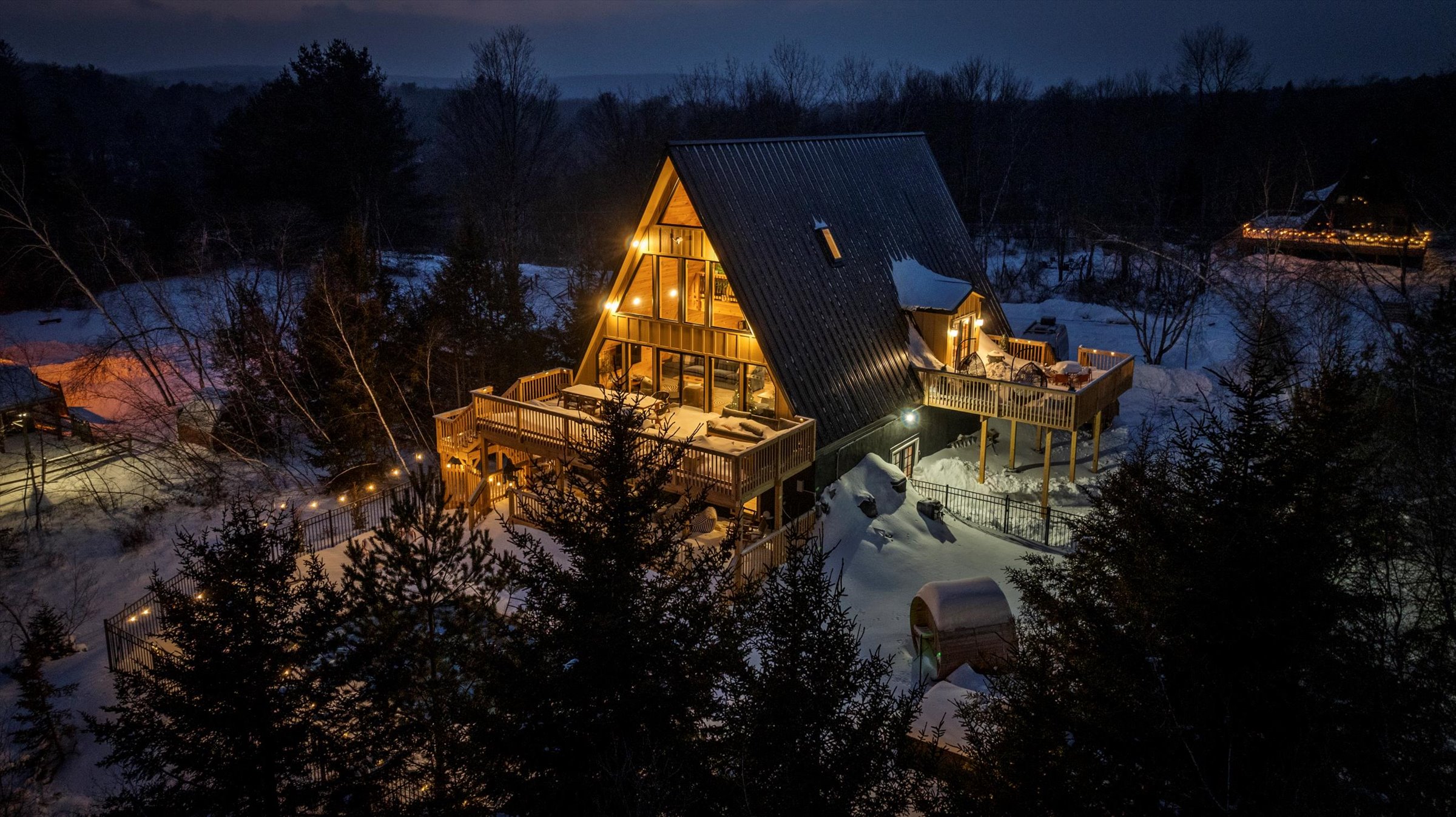 Aery LakeHaus at twilight — a CopperGround home in the Poconos
