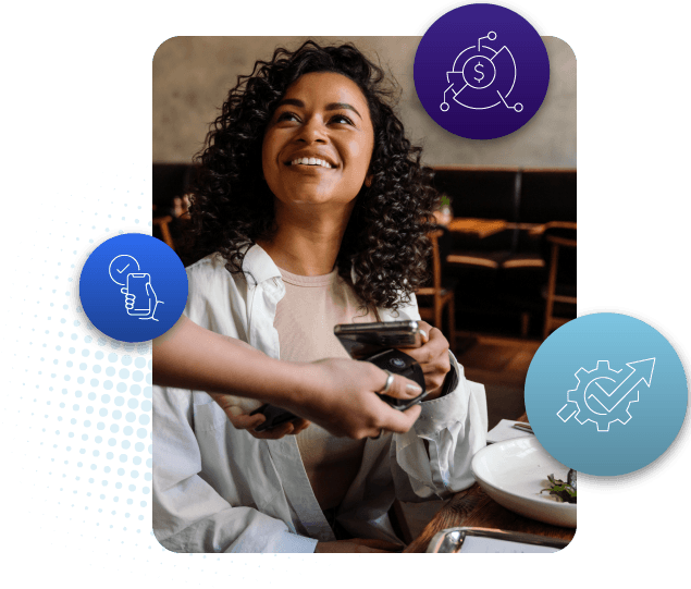 A happy person holding a phone with finance related icons swirling around.