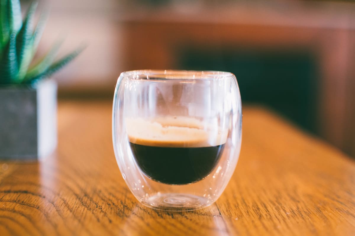Espresso in a double-walled glass, coffee shop product shot