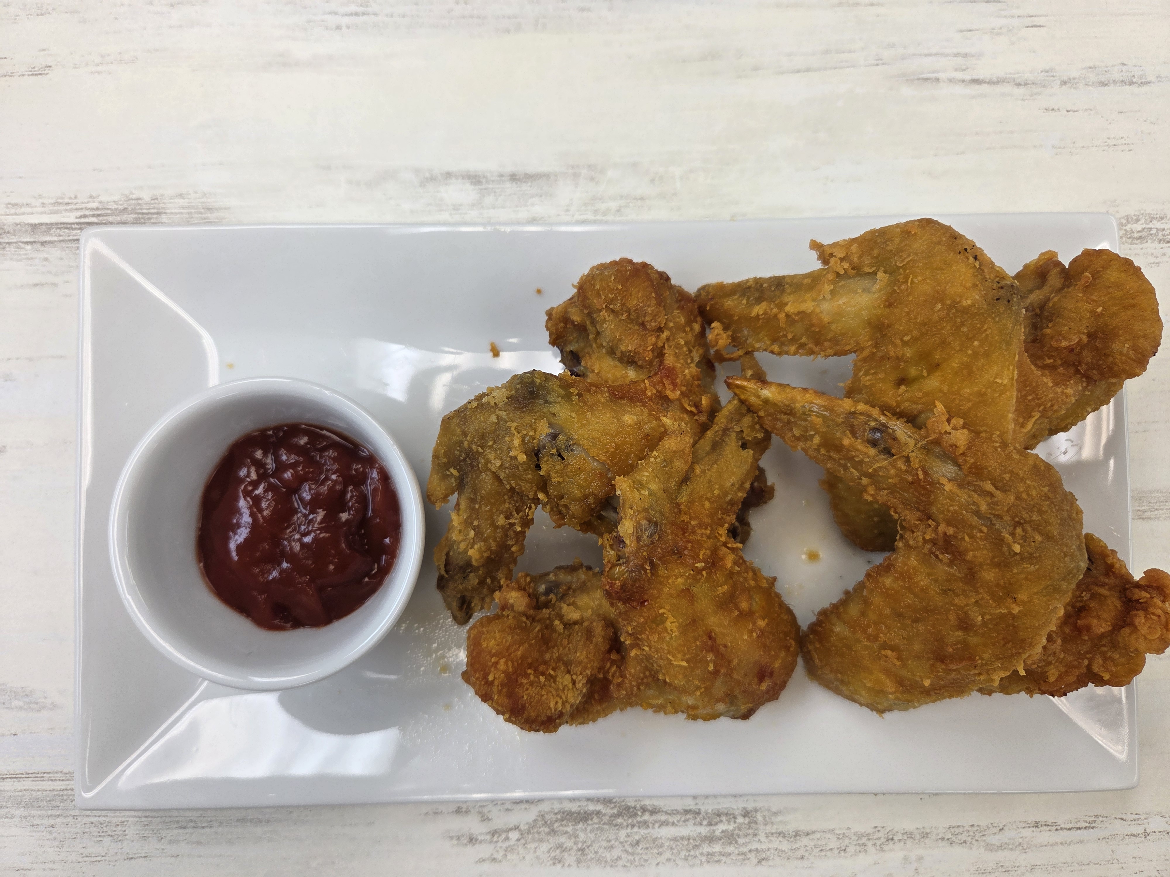Fried Chicken Wings at Sweet Catch and Tasty Bites