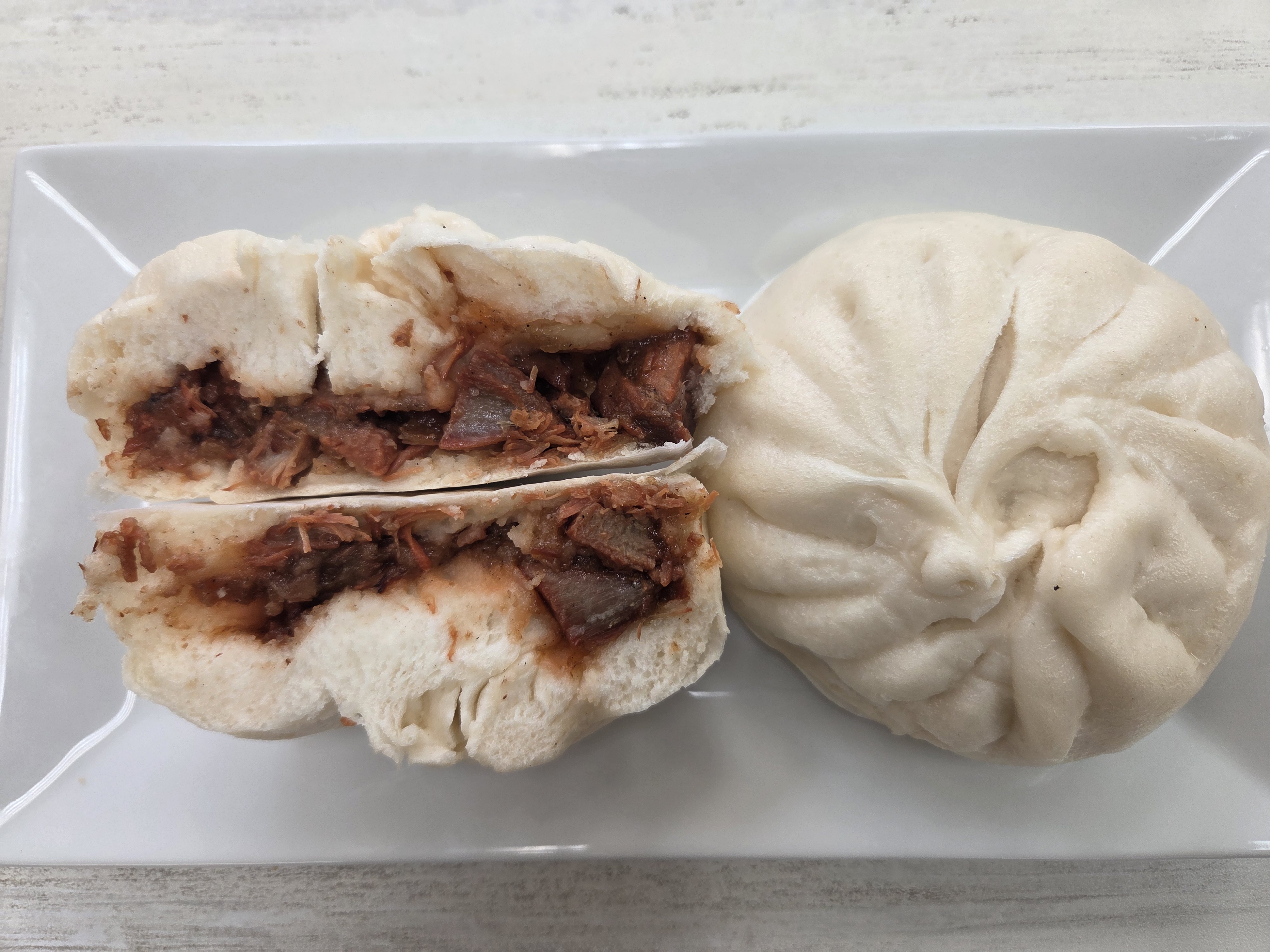 Steamed Pork Bun at Sweet Catch and Tasty Bites