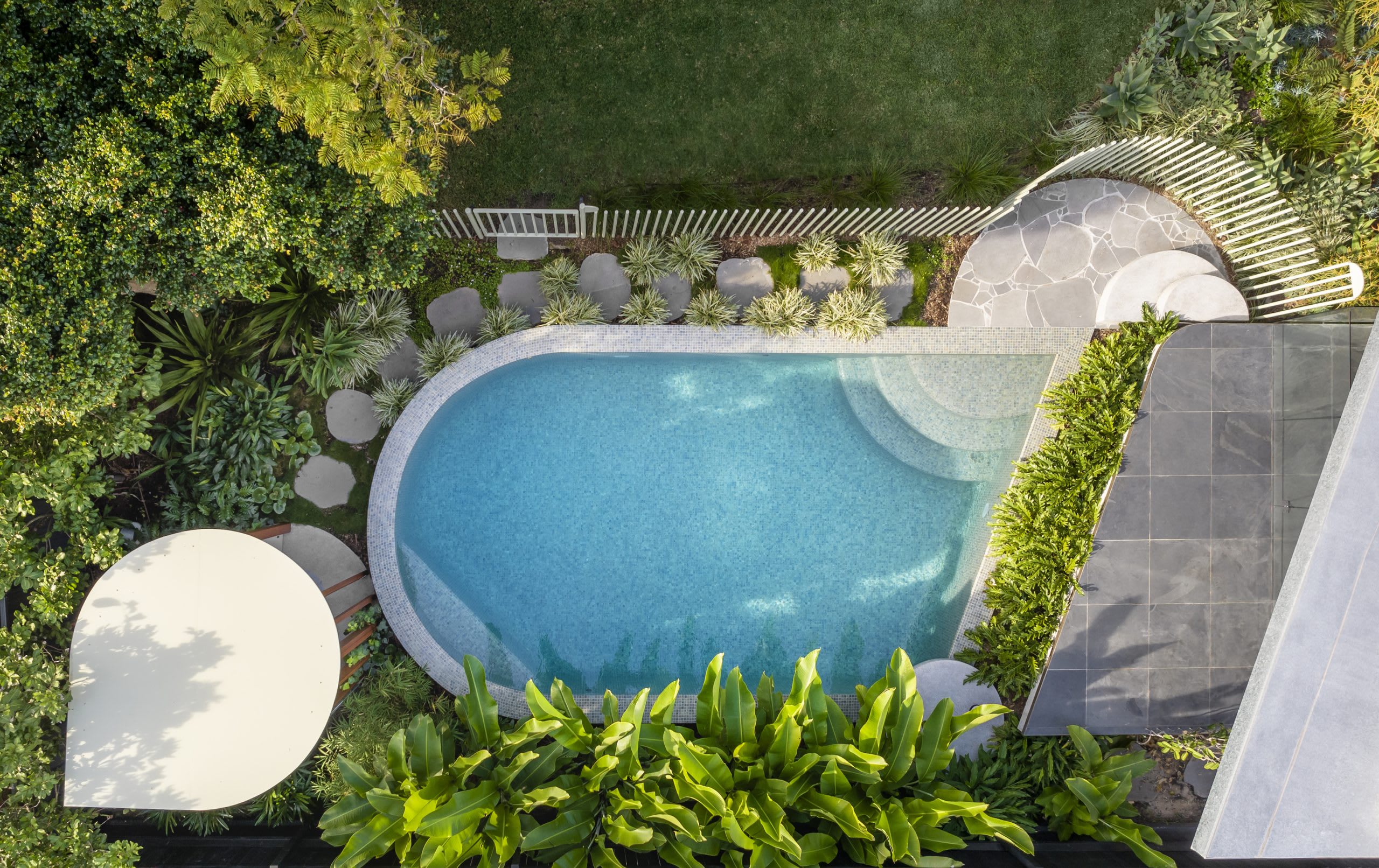 Elevate Your Backyard with a Tropical Pool Design