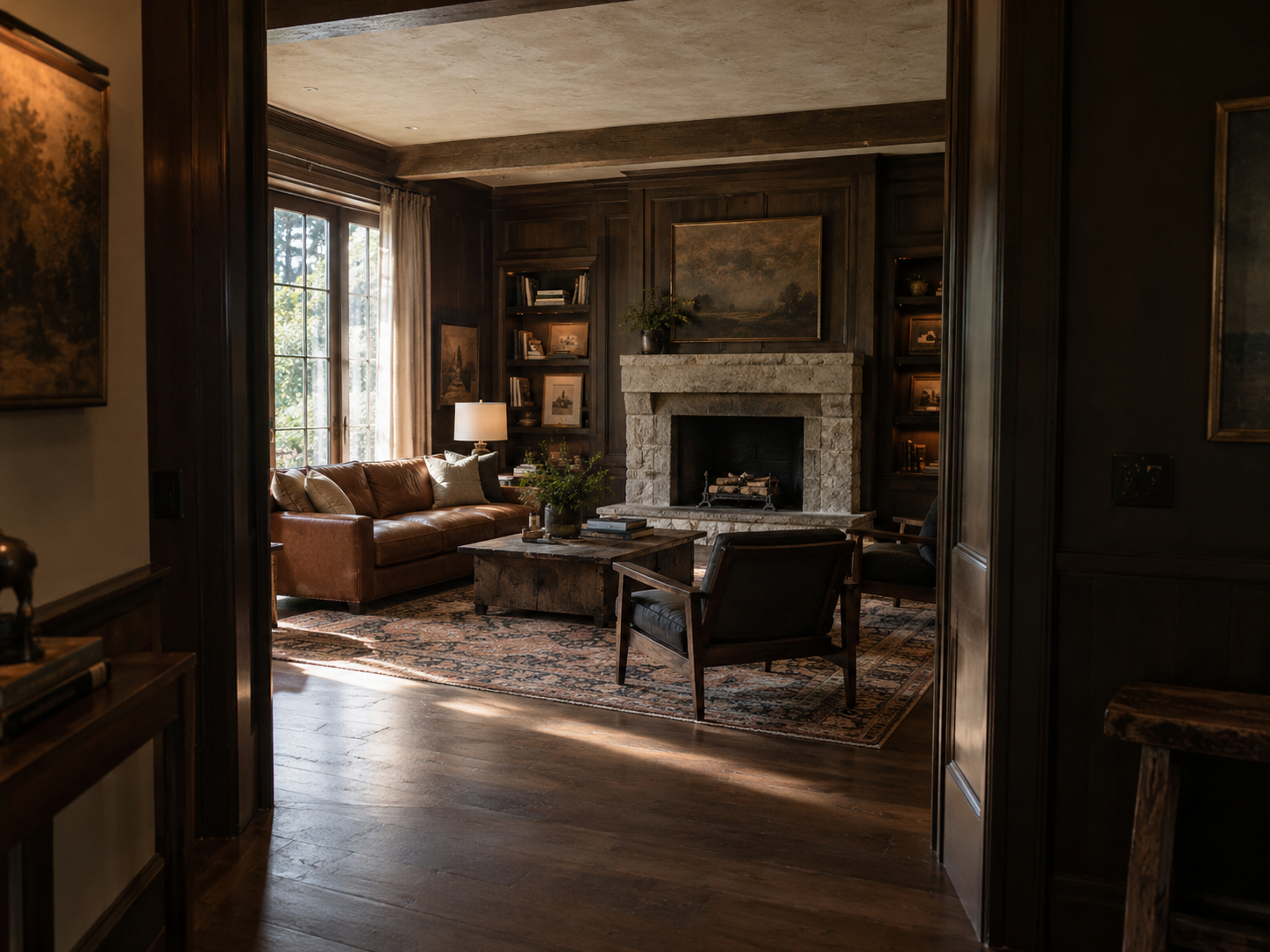Living room blending antique furniture with contemporary design elements for a personal, collected aesthetic