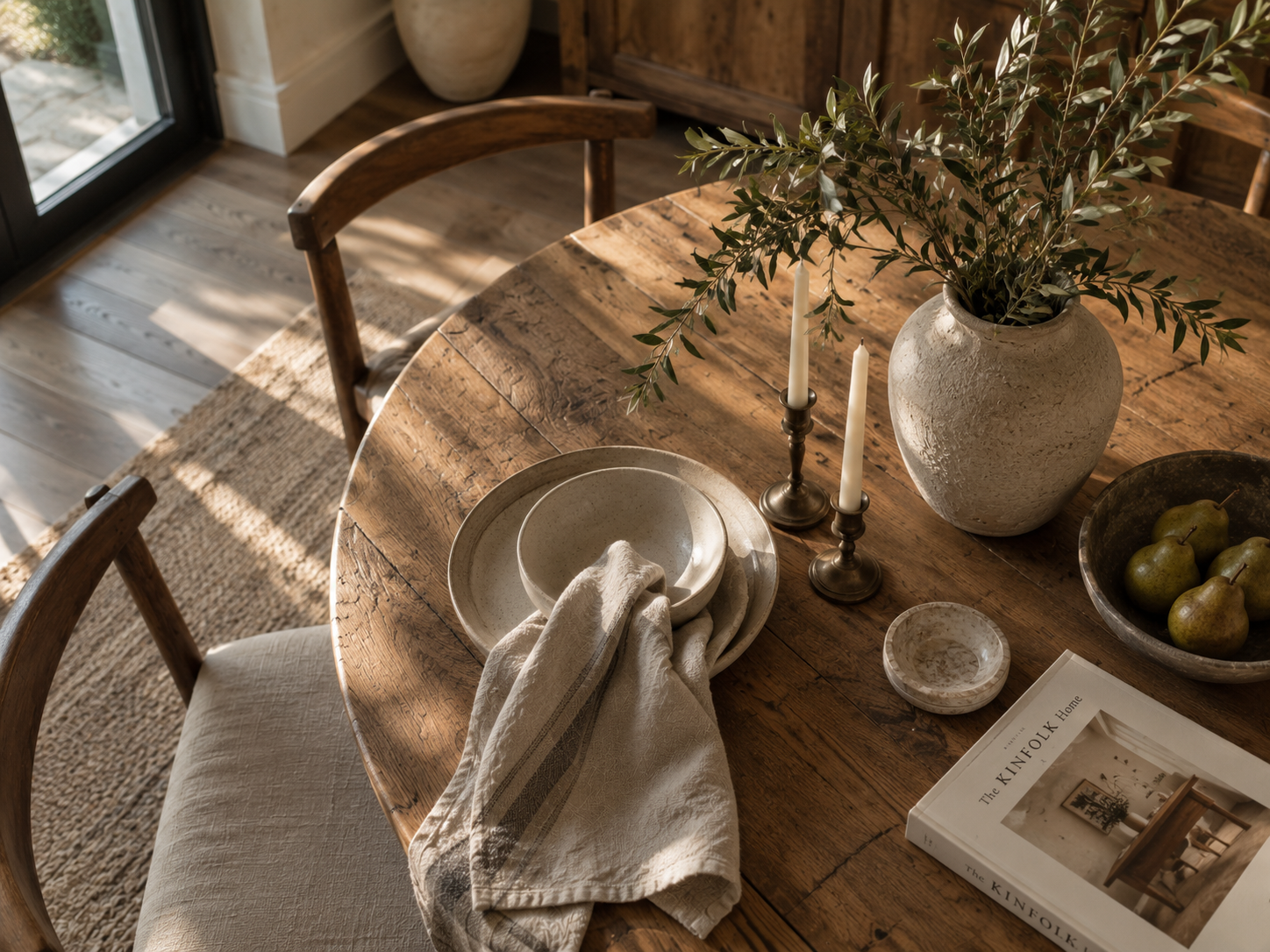 Carefully styled interior surface with a few considered objects arranged with restraint and intention