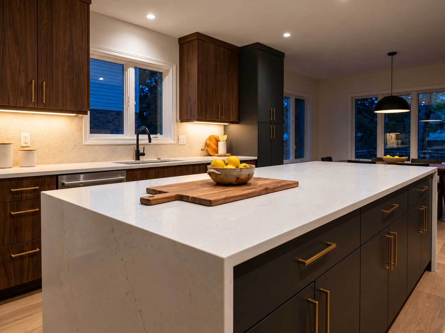 Balanced and considered kitchen design with calm tones and natural materials creating an effortless atmosphere