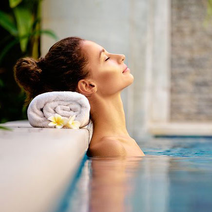 woman relaxing in a pool