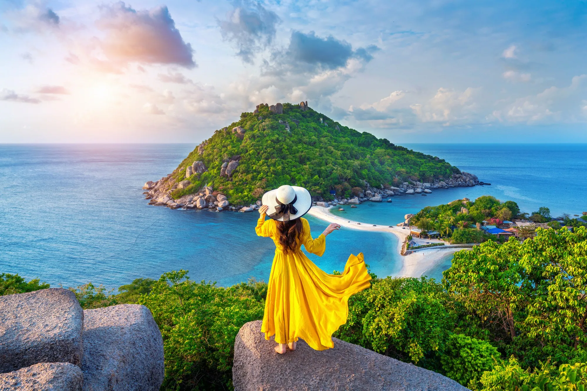 Traveller overlooking a scenic coastline
