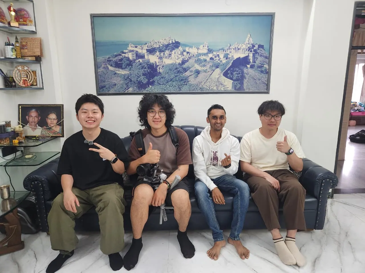 Coolpanda travellers relaxing together on a sofa