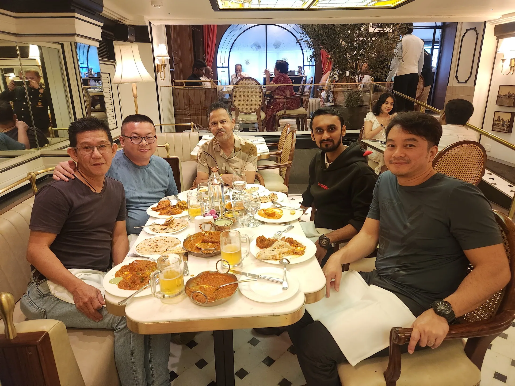 A large Coolpanda group sharing a meal at a restaurant