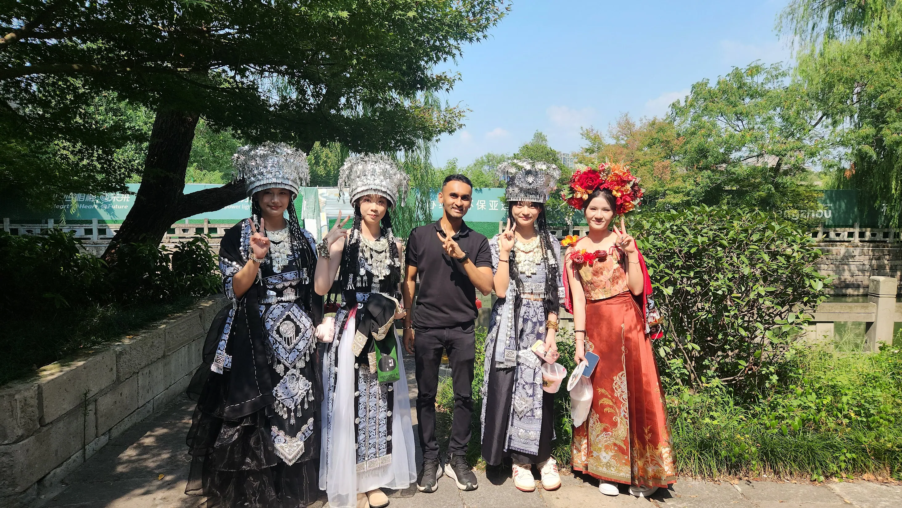 A Coolpanda group in festive Indian attire outdoors
