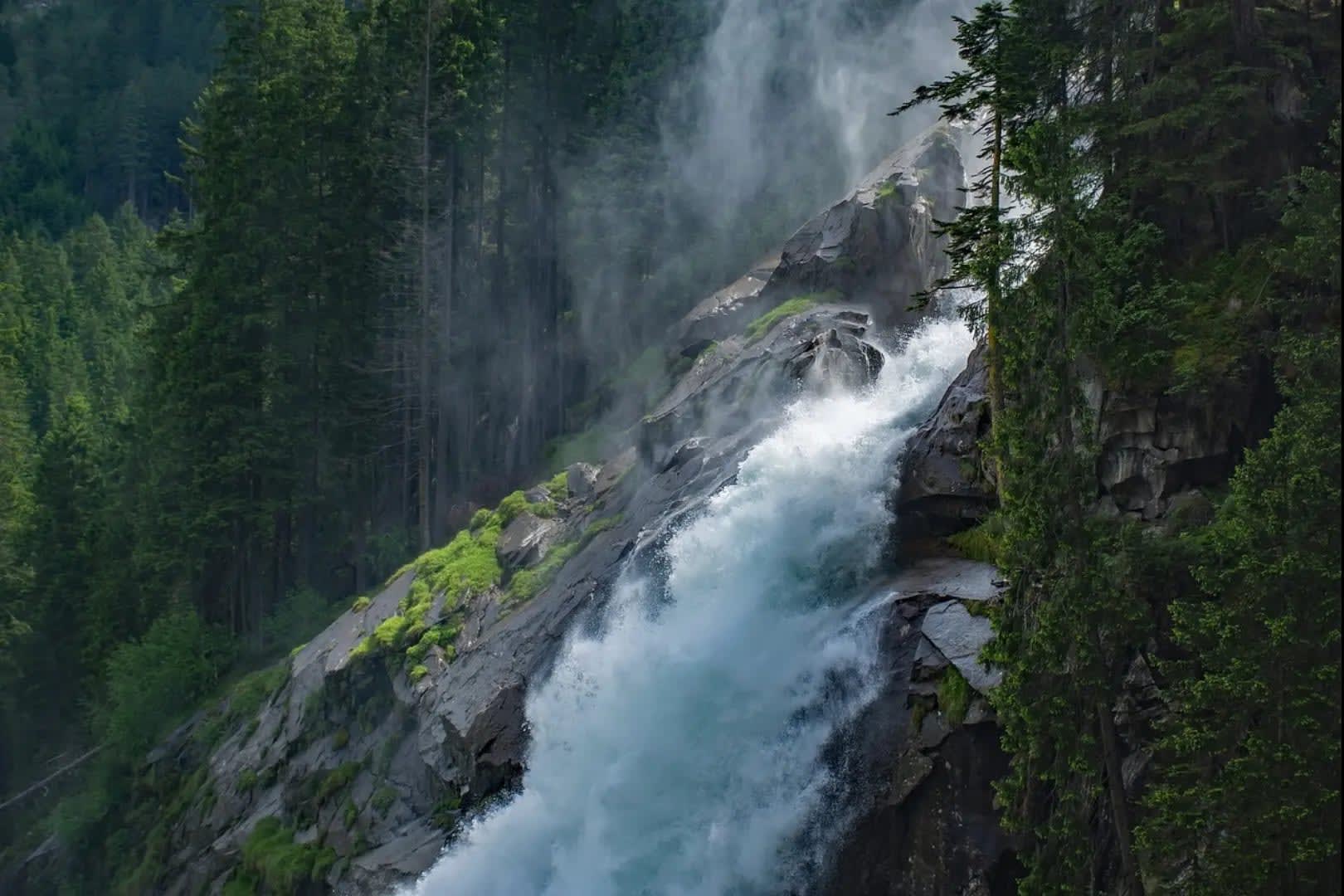Waterfall in a wooded mountain, Krimml Waterfalls