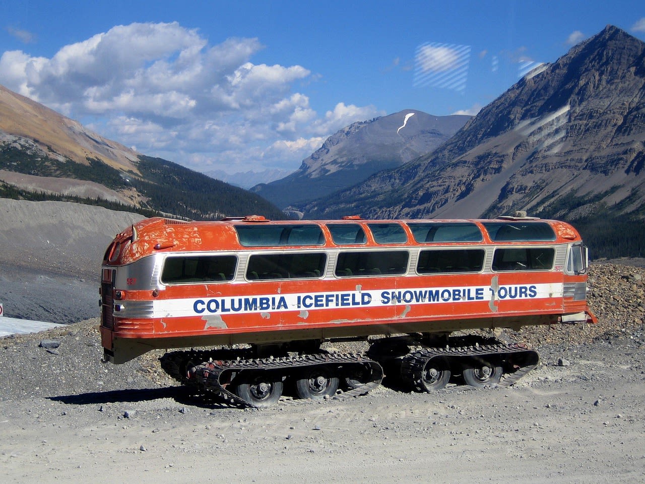 Columbia Icefield and Athabasca Glacier descending into the valley floor on the Icefields Parkway