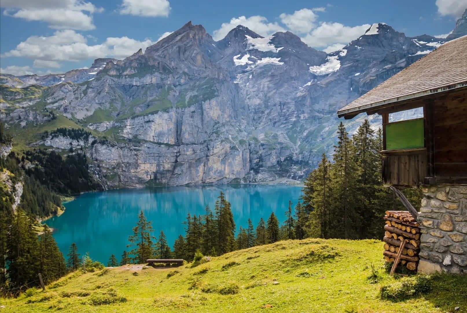 Mountain peaks at sunset, surrounded by wooded hills. Serra dos Órgãos National Park