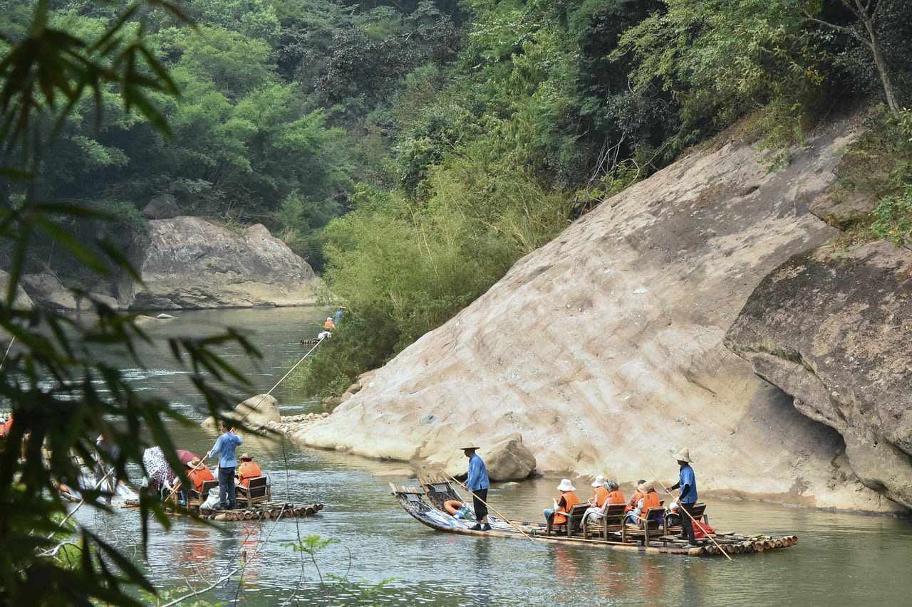 The Tianyou Peak summit view over the mist-filled valleys of Wuyi Mountain Nature Reserve Fujian China