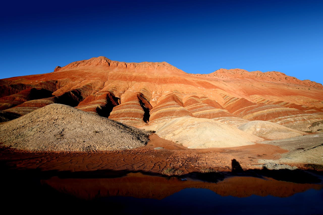 Brown hills with some vegetation, Zhangye Danxia Landform
