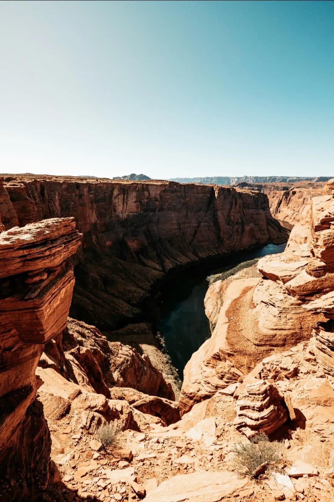 River flowing through the depths of the Grand Canyon, framed by towering rock walls
