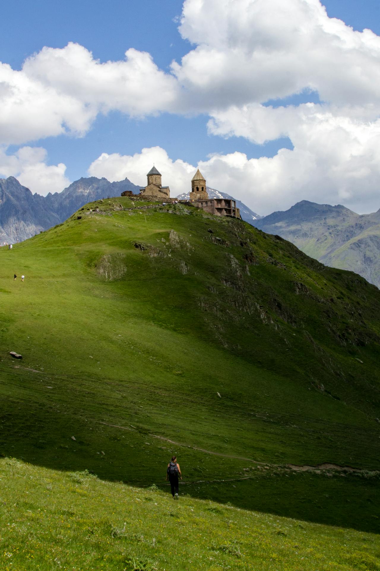 Traditional Georgian stone watchtower in an alpine village below the Caucasus mountains near Kazbegi