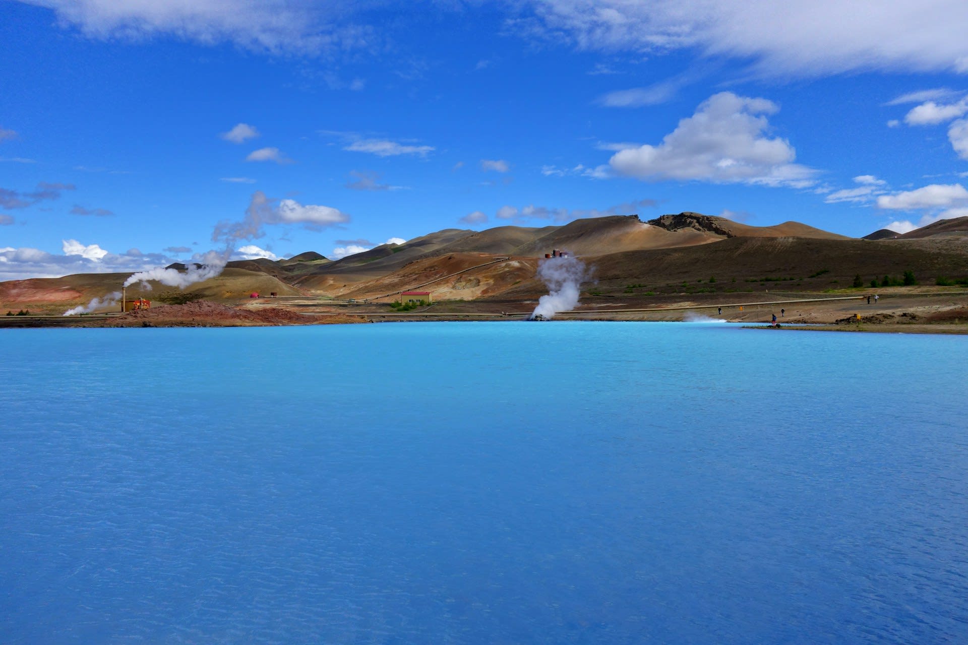 Aerial view of the Blue Lagoon complex amid dark volcanic lava fields on the Reykjanes Peninsula