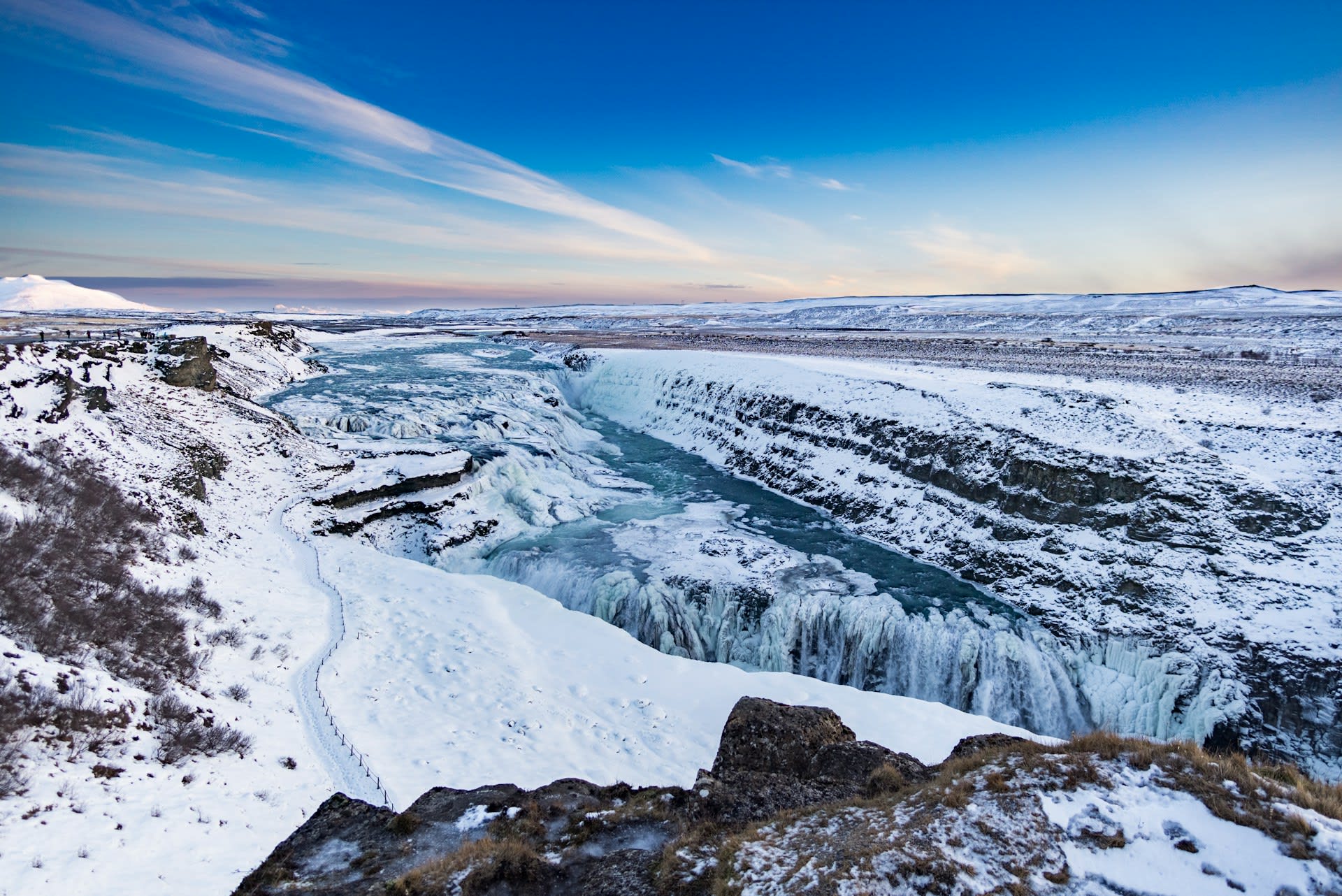 Gullfoss double waterfall thundering into a basalt canyon in the Icelandic highlands