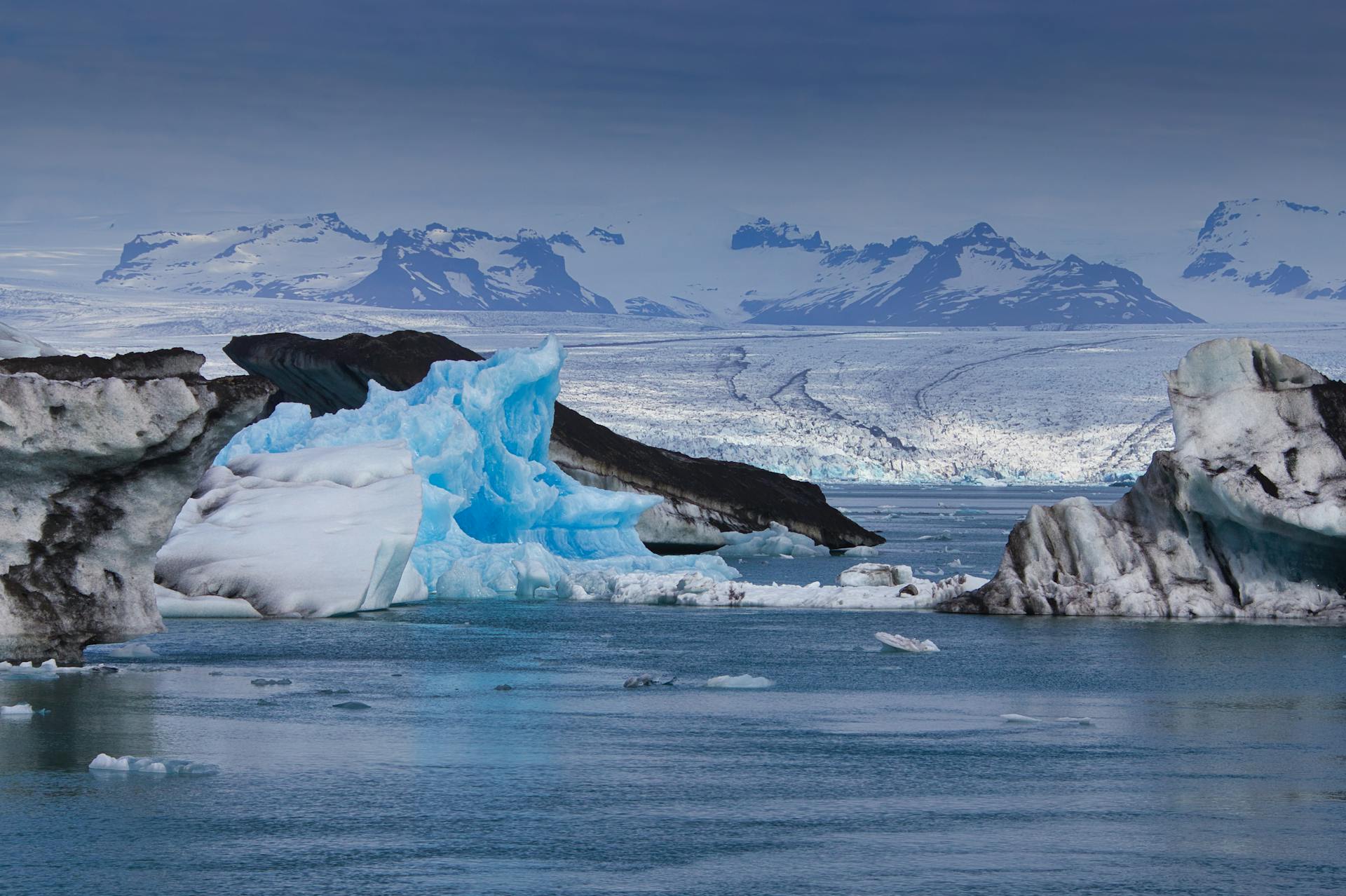 Blue icebergs floating in Jökulsárlón glacial lagoon in southeastern Iceland