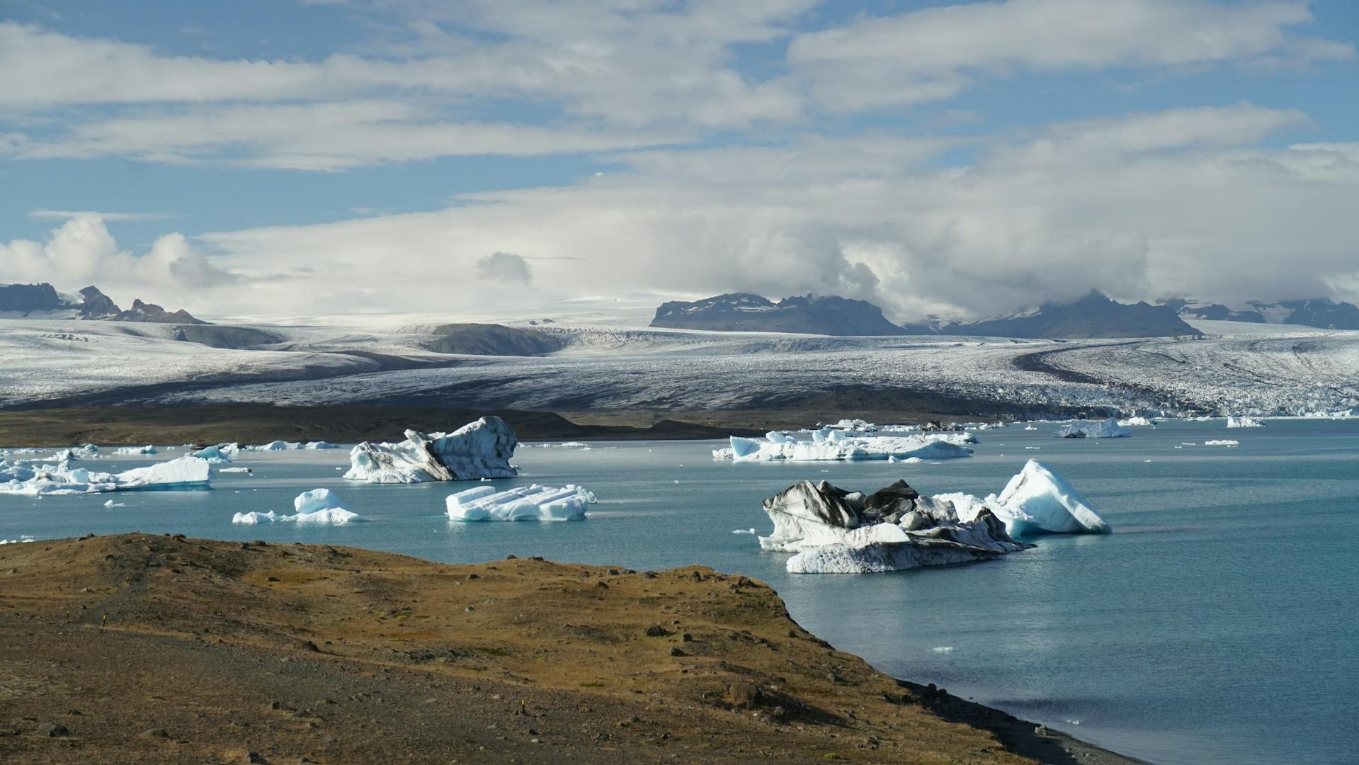 Zodiac boat tour among towering ice formations at Jökulsárlón glacial lagoon Iceland