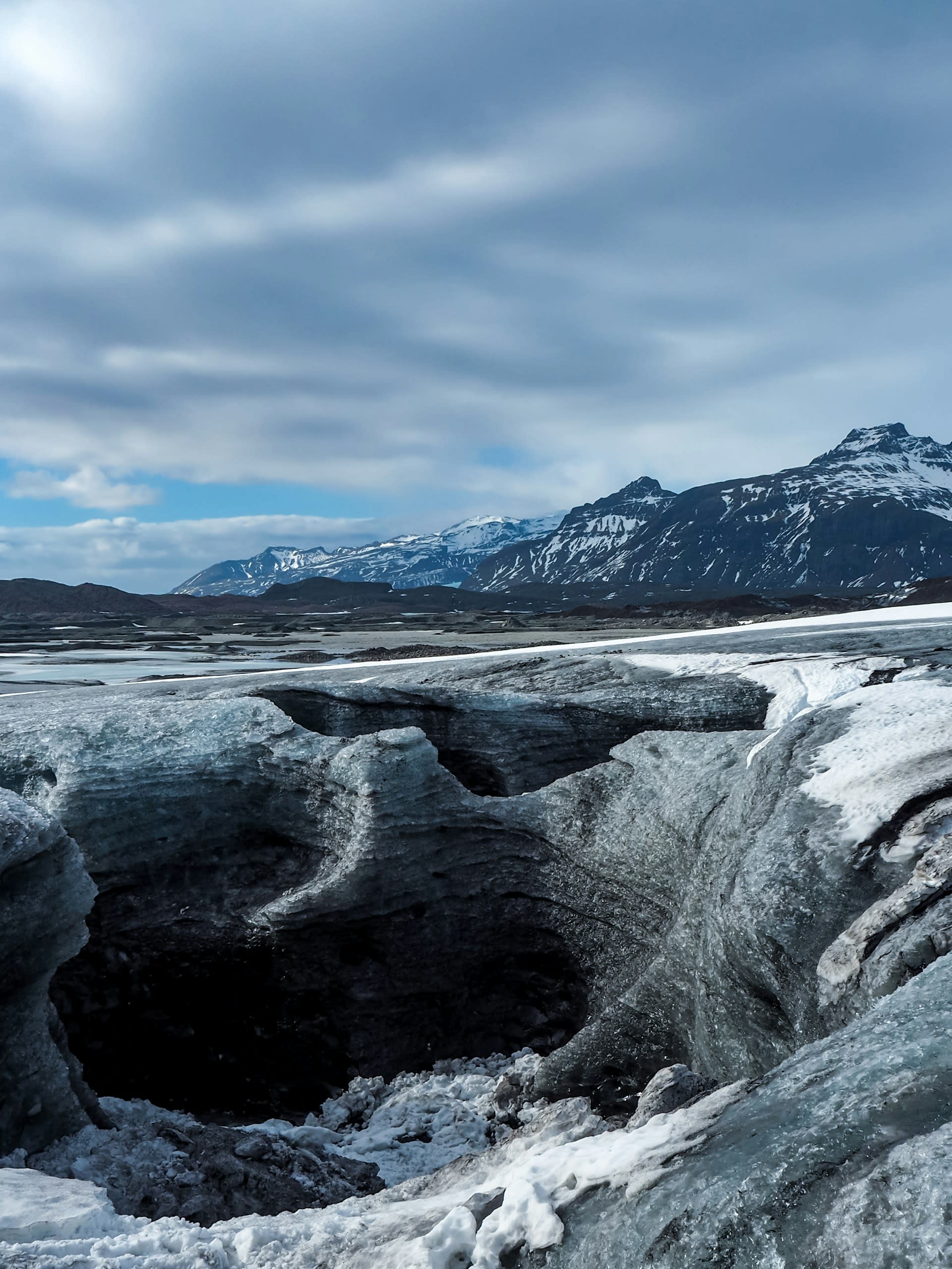 Jökulsárlón glacial lagoon with blue icebergs calved from Breiðamerkurjökull outlet glacier Iceland