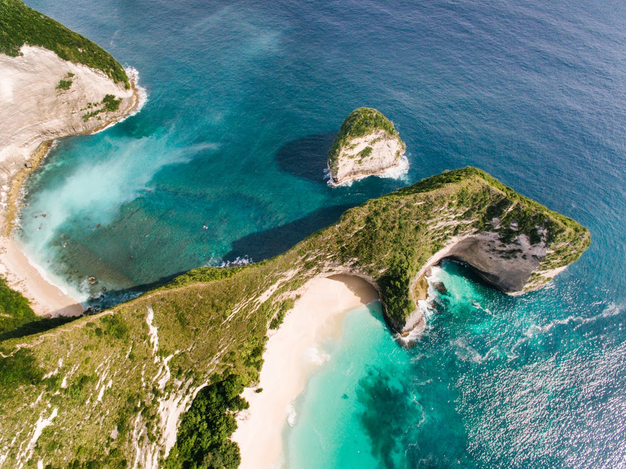 Manta ray gliding through the clear blue water at Manta Point Nusa Penida Bali Indonesia