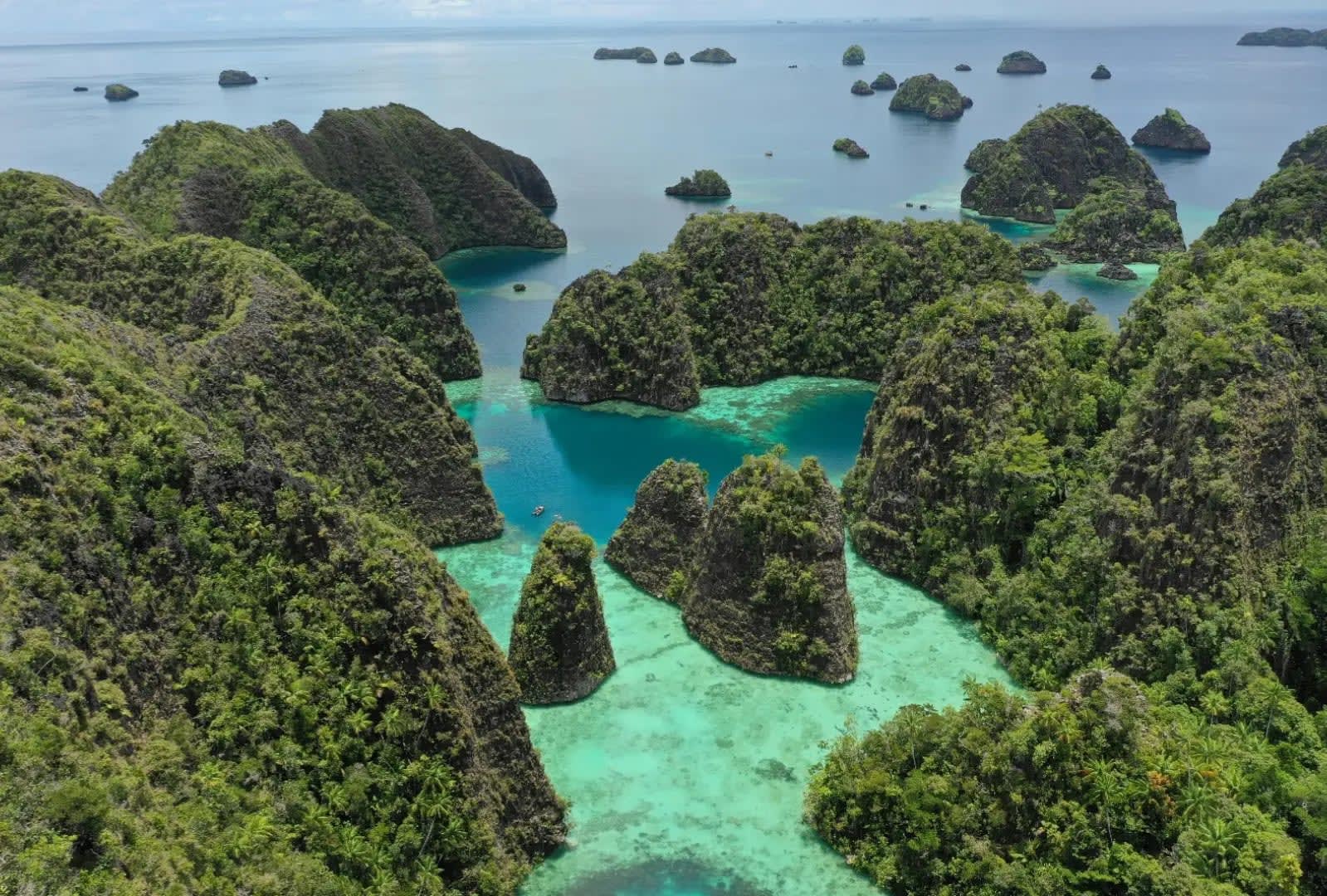 Several small islands in the middle of the sea, Raja Ampat
