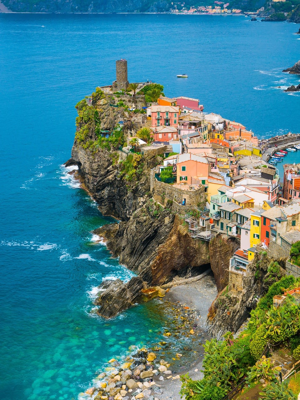 Terraced vineyards on the steep cliffs above the village of Corniglia in Cinque Terre Liguria