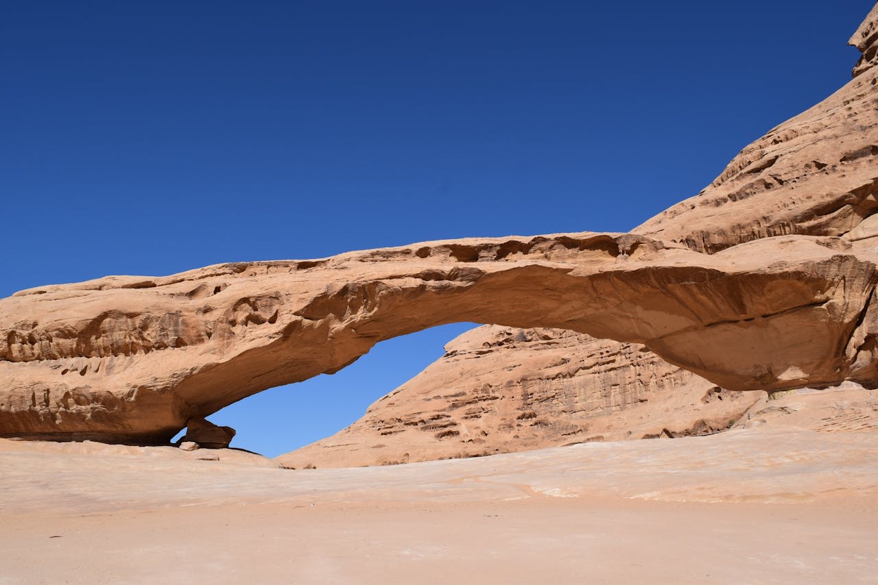 Rock engravings and Nabataean inscriptions carved in sandstone in Wadi Rum desert Jordan