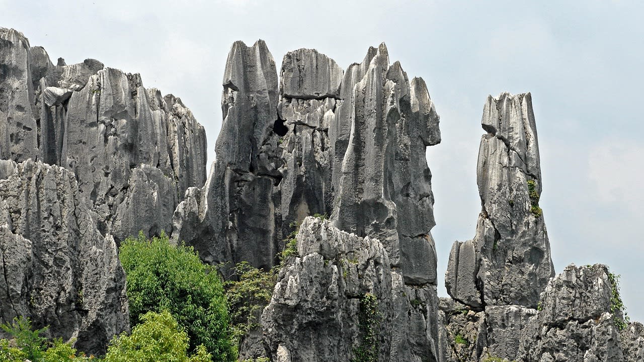 Aerial view of the Tsingy de Bemaraha landscape with the Manambolo river gorge cutting through the plateau