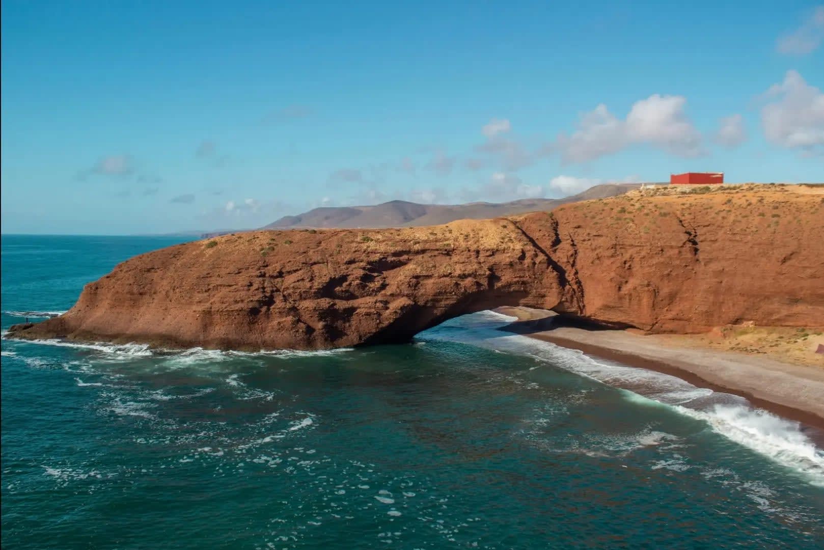 Shati Legzira, A mountain extending into the beach, creating a gap beneath the sand
