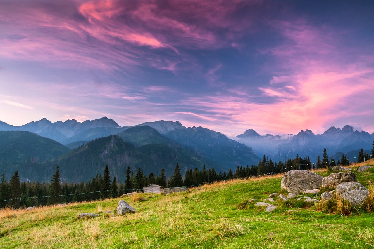 Granite peaks of the Tatra Mountains reflected in the glacial Morskie Oko lake in southern Poland