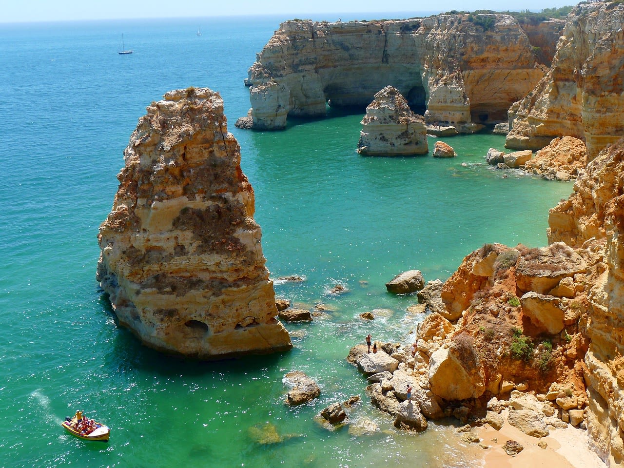 man in a cave with water, Algarve