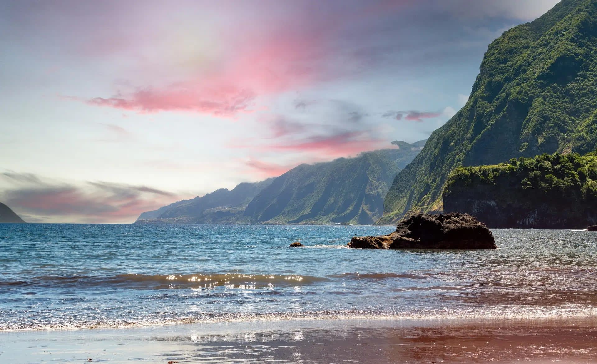 Madeira A beach with mountain ranges to the right