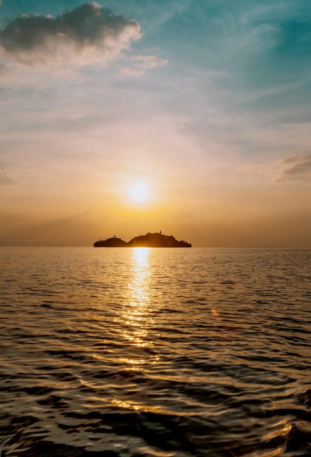 Sunset in lonely island in the middle of a large lake with ,Lake Kivu