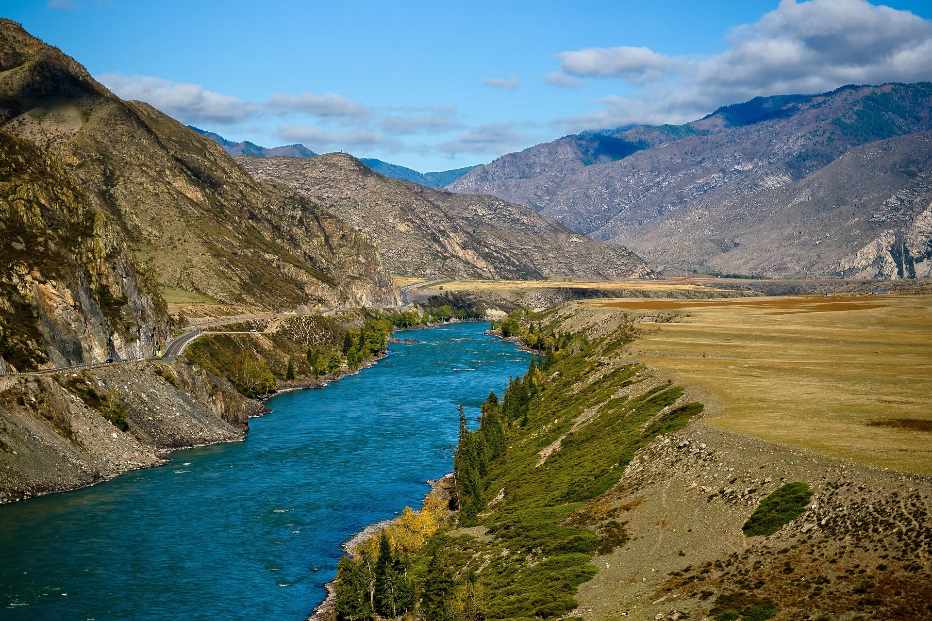 Turquoise Katun River winding through the Altai Mountain valley, Russia